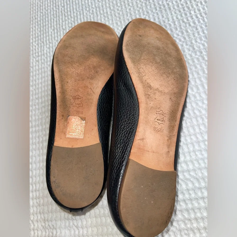 Tory Burch Black Flats with Gold Emblem